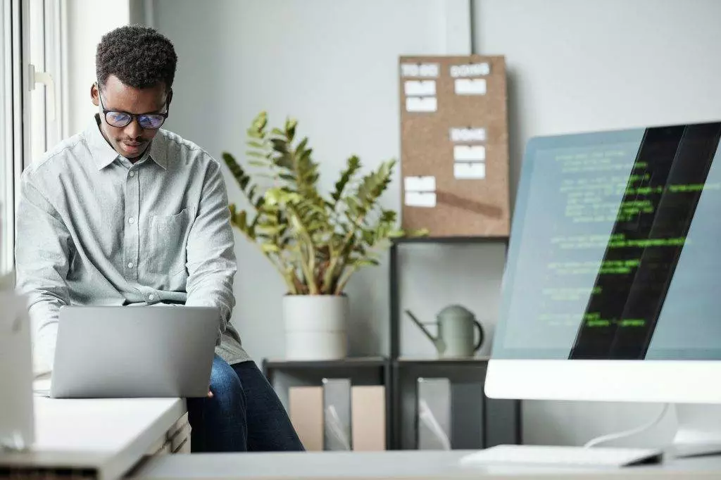 Young Software Developer in Office